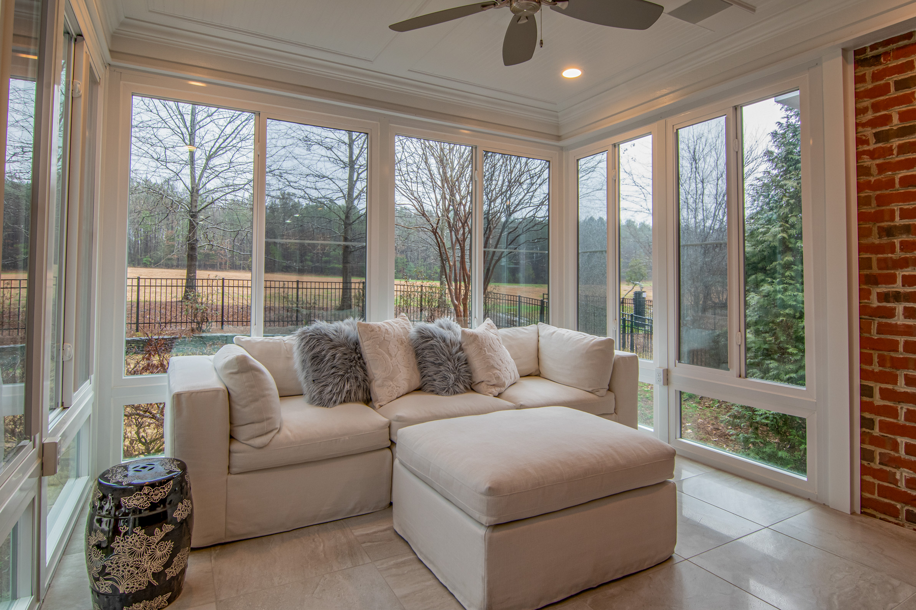 White Sofa Near Glass Window